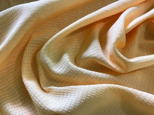 Вафельное полотенце персикового цвета фото
